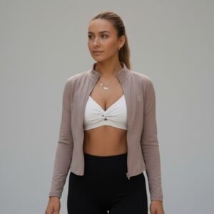 image wearing white bra and beige LF Jacket