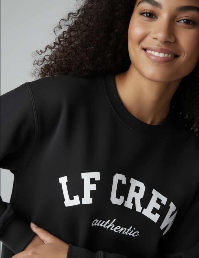 close up image of female wearing LF CREW sweatshirt