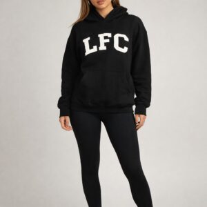 image of women wearing a black hoodie with LFC across the front
